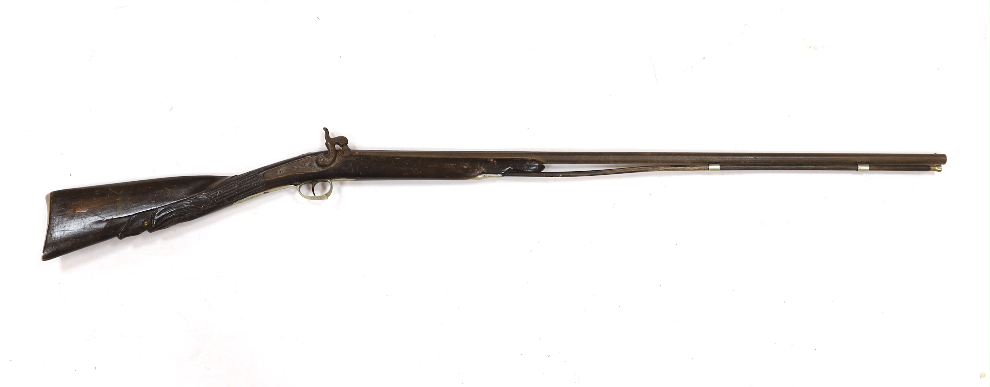 A Belgian back action percussion sporting gun made for the South American market c.1900, with engraved nickel furniture and half stocked barrel, barrel 82cm